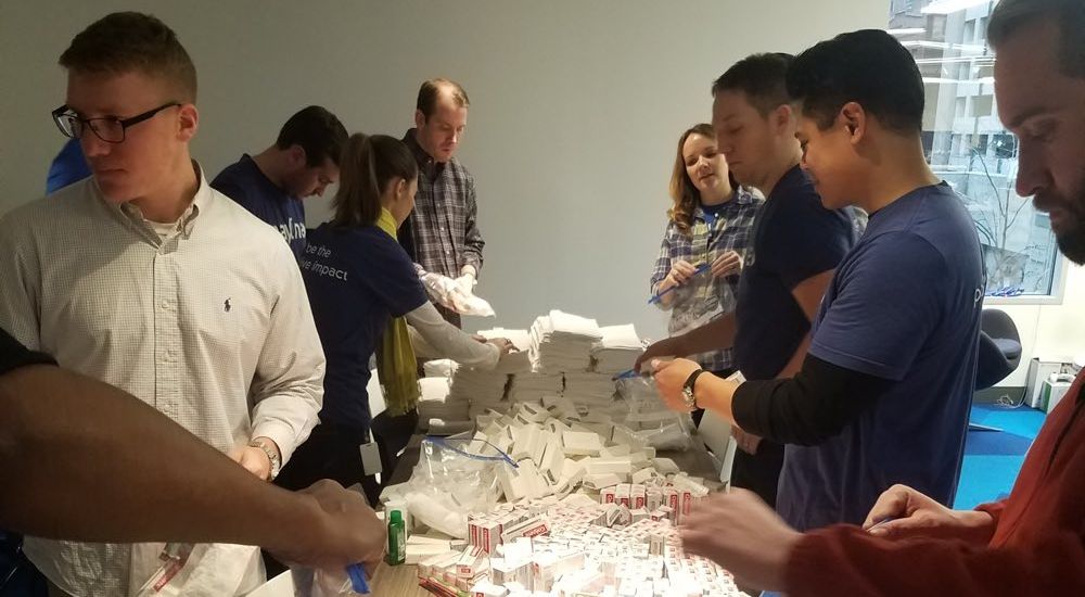 The Night Ministry volunteers sorting hygiene products for the agency's clients